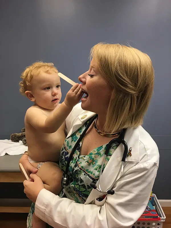 Kate Shand with a baby