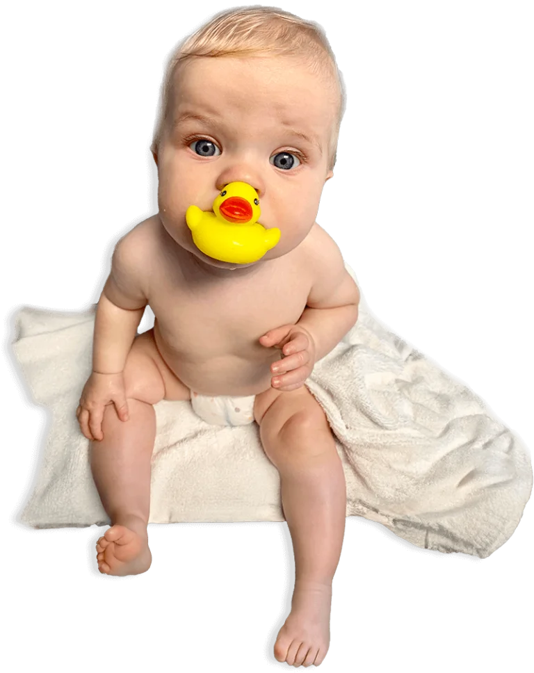 closeup of baby with ducky pacifier in his mouth